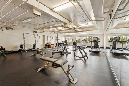 15-117 Rockyledge View Nw, Calgary, AB - Indoor Photo Showing Gym Room