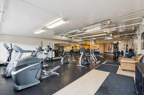 15-117 Rockyledge View Nw, Calgary, AB - Indoor Photo Showing Gym Room
