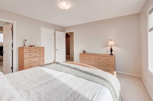 45 Cougarstone Place Sw, Calgary, AB - Indoor Photo Showing Bedroom
