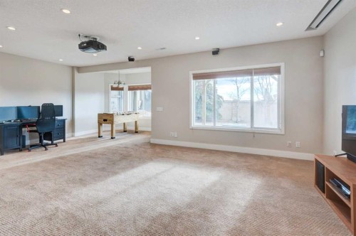 45 Cougarstone Place Sw, Calgary, AB - Indoor With Fireplace