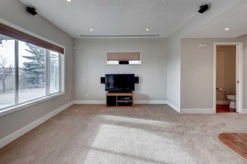 45 Cougarstone Place Sw, Calgary, AB - Indoor Photo Showing Living Room