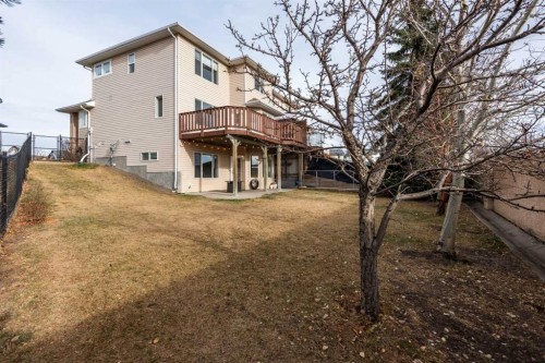 45 Cougarstone Place Sw, Calgary, AB - Outdoor With Deck Patio Veranda