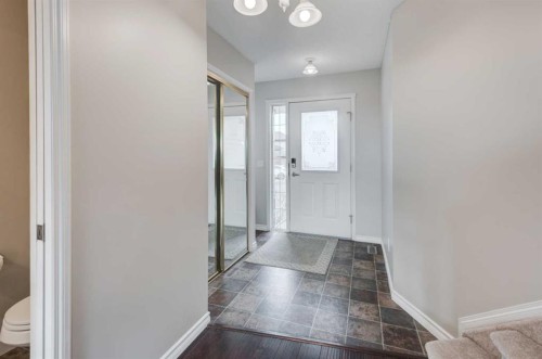 45 Cougarstone Place Sw, Calgary, AB - Indoor Photo Showing Other Room