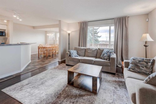 45 Cougarstone Place Sw, Calgary, AB - Indoor Photo Showing Living Room