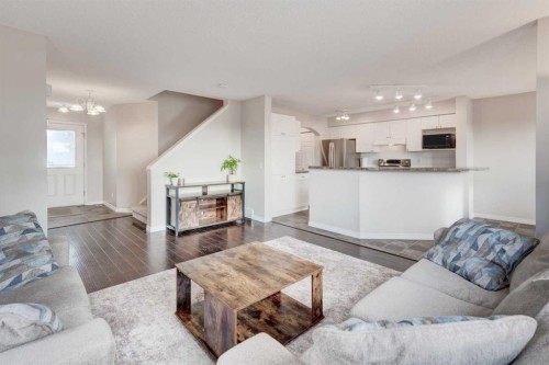 45 Cougarstone Place Sw, Calgary, AB - Indoor Photo Showing Living Room