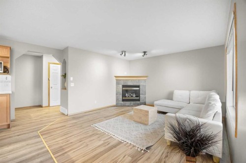 11 Citadel Meadow Crescent Nw, Calgary, AB - Indoor Photo Showing Living Room With Fireplace