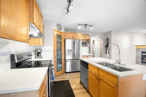 11 Citadel Meadow Crescent Nw, Calgary, AB - Indoor Photo Showing Kitchen With Stainless Steel Kitchen With Double Sink