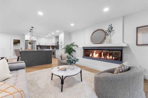 10404 Maplemont Road Se, Calgary, AB - Indoor Photo Showing Living Room With Fireplace