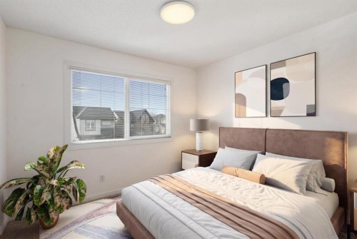 114 New Brighton Landing Se, Calgary, AB - Indoor Photo Showing Bedroom