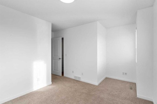 114 New Brighton Landing Se, Calgary, AB - Indoor Photo Showing Other Room