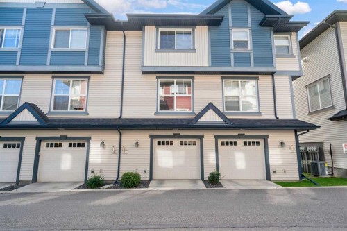 114 New Brighton Landing Se, Calgary, AB - Outdoor With Facade