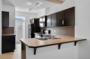 114 New Brighton Landing Se, Calgary, AB  - Indoor Photo Showing Kitchen With Double Sink 
