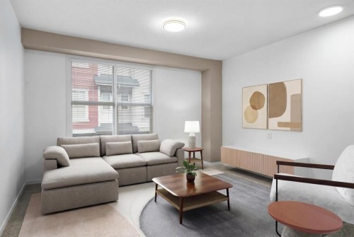 114 New Brighton Landing Se, Calgary, AB - Indoor Photo Showing Living Room