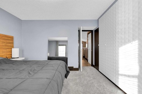 210 Copperstone Grove Se, Calgary, AB - Indoor Photo Showing Bedroom