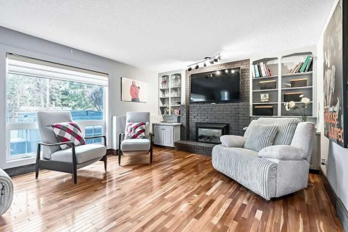 804 Varsity Estates Place Nw, Calgary, AB - Indoor Photo Showing Living Room With Fireplace