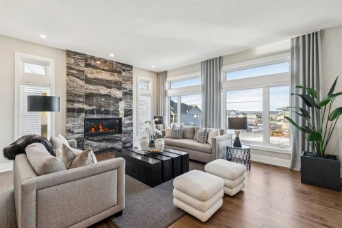 92 Crestridge View Sw, Calgary, AB - Indoor Photo Showing Living Room With Fireplace