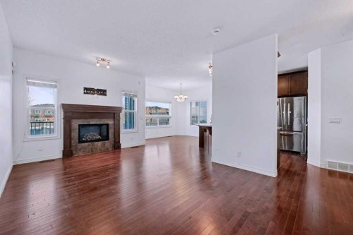 187 Sage Hill Green Nw, Calgary, AB - Indoor Photo Showing Living Room With Fireplace