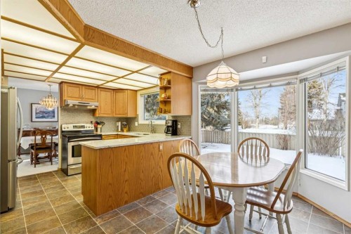 212 Oakside Circle Sw, Calgary, AB - Indoor Photo Showing Other Room