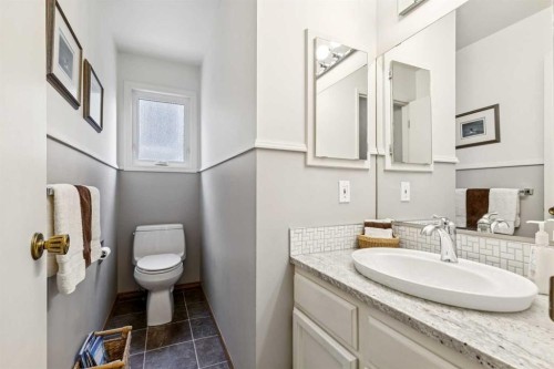 212 Oakside Circle Sw, Calgary, AB - Indoor Photo Showing Bathroom