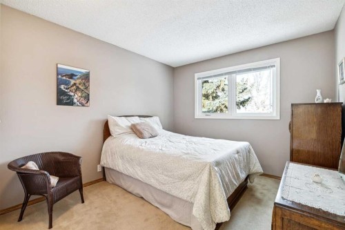 212 Oakside Circle Sw, Calgary, AB - Indoor Photo Showing Bedroom