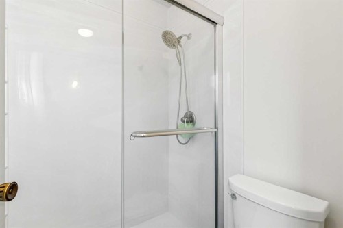 212 Oakside Circle Sw, Calgary, AB - Indoor Photo Showing Bathroom