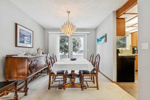 212 Oakside Circle Sw, Calgary, AB - Indoor Photo Showing Dining Room