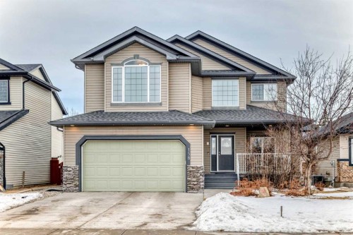 158 Invermere Drive, Chestermere, AB - Outdoor With Facade