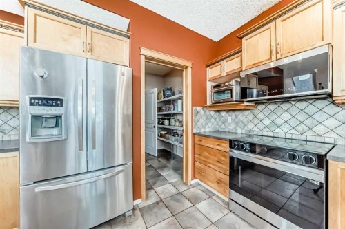 158 Invermere Drive, Chestermere, AB - Indoor Photo Showing Kitchen