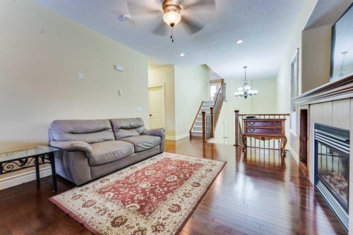 415 Taralake Way Ne, Calgary, AB - Indoor Photo Showing Living Room With Fireplace