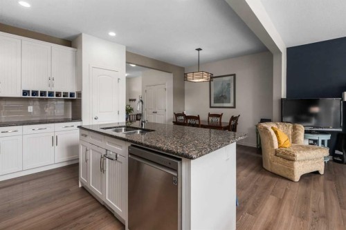 390 River Heights Crescent, Cochrane, AB - Indoor Photo Showing Kitchen With Double Sink