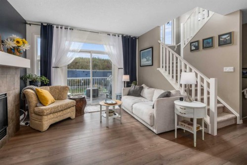 390 River Heights Crescent, Cochrane, AB - Indoor Photo Showing Living Room