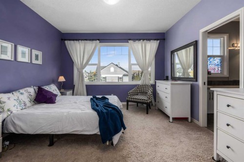 390 River Heights Crescent, Cochrane, AB - Indoor Photo Showing Bedroom