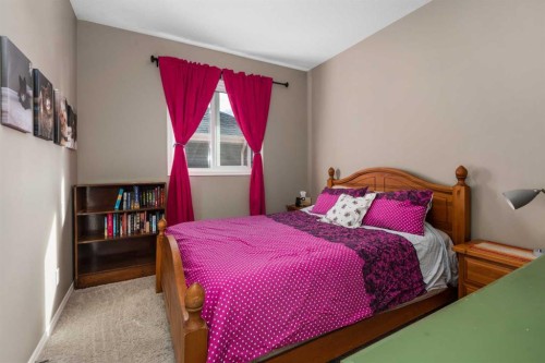 390 River Heights Crescent, Cochrane, AB - Indoor Photo Showing Bedroom