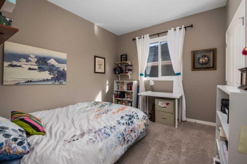 390 River Heights Crescent, Cochrane, AB - Indoor Photo Showing Bedroom