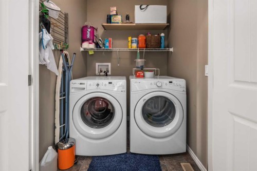 390 River Heights Crescent, Cochrane, AB - Indoor Photo Showing Laundry Room