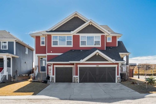 390 River Heights Crescent, Cochrane, AB - Outdoor With Facade