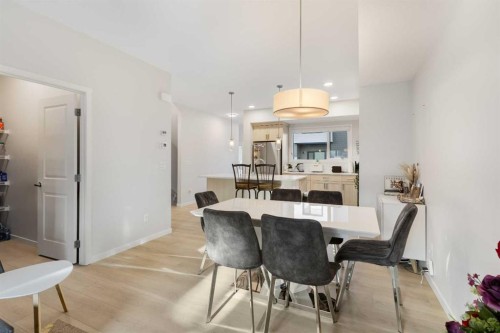 405-20295 Seton Way Se, Calgary, AB - Indoor Photo Showing Dining Room