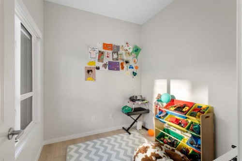 405-20295 Seton Way Se, Calgary, AB - Indoor Photo Showing Bedroom