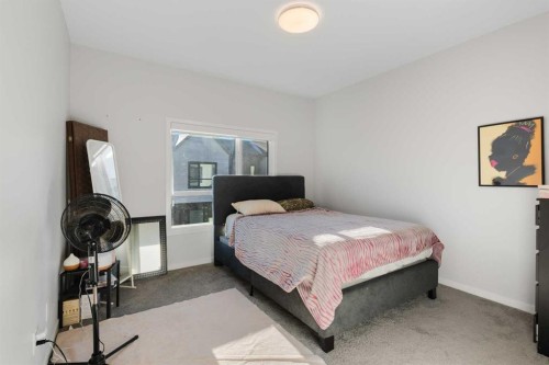 405-20295 Seton Way Se, Calgary, AB - Indoor Photo Showing Bedroom
