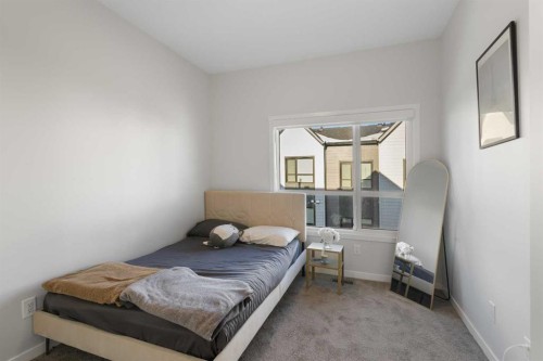 405-20295 Seton Way Se, Calgary, AB - Indoor Photo Showing Bedroom