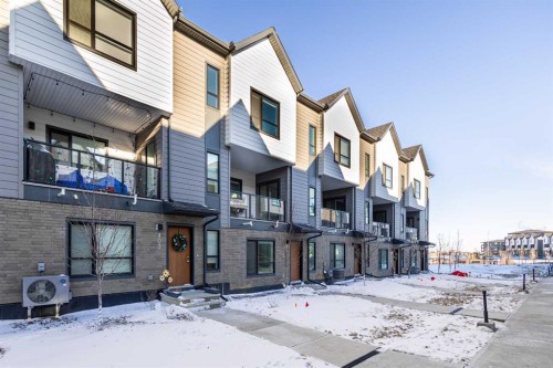405-20295 Seton Way Se, Calgary, AB - Outdoor With Balcony With Facade