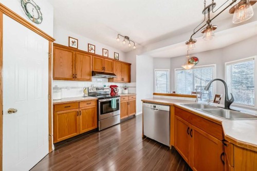 38 Mt Douglas Close Se, Calgary, AB - Indoor Photo Showing Kitchen With Double Sink