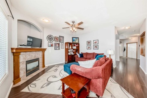 38 Mt Douglas Close Se, Calgary, AB - Indoor Photo Showing Living Room With Fireplace