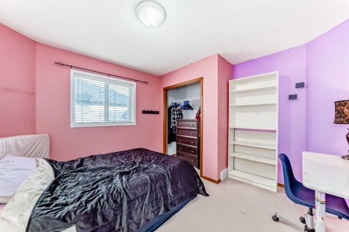 38 Mt Douglas Close Se, Calgary, AB - Indoor Photo Showing Bedroom