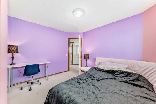 38 Mt Douglas Close Se, Calgary, AB - Indoor Photo Showing Bedroom