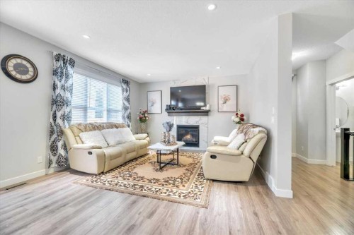 81 Legacy Woods Place Se, Calgary, AB - Indoor Photo Showing Living Room With Fireplace