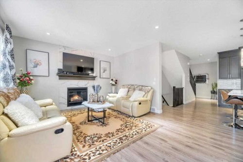 81 Legacy Woods Place Se, Calgary, AB - Indoor Photo Showing Living Room With Fireplace