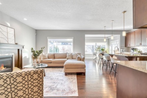 175 Everbrook Drive Sw, Calgary, AB - Indoor Photo Showing Living Room With Fireplace