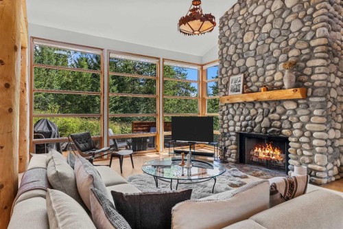 24 Blue Grouse Ridge, Canmore, AB - Indoor Photo Showing Living Room With Fireplace