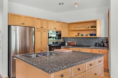 24 Blue Grouse Ridge, Canmore, AB - Indoor Photo Showing Kitchen With Double Sink
